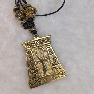 Vintage 1980s Egyptomania Necklace, Black Cord with Gold Tone Amulet and Beads